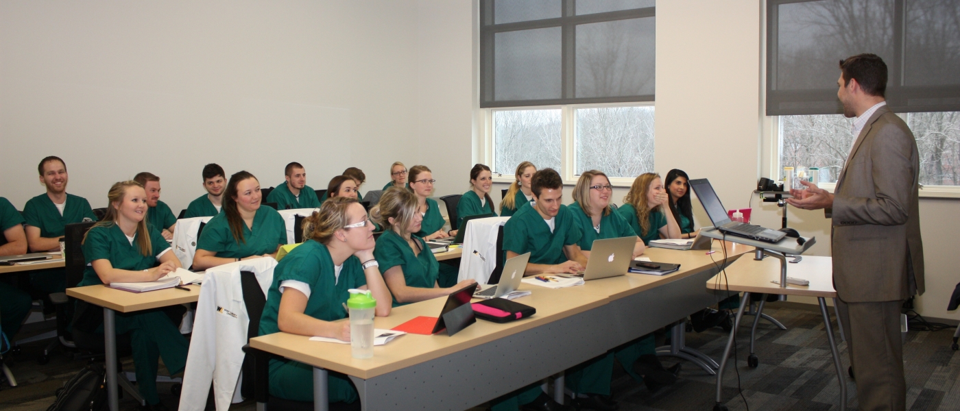people smiling in a classroom